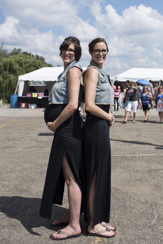 Julie, left, and Lisa York, 31, pose for a portrait at the 40th annual Twins Days Festival in Twinsberg, Ohio on August 8, 2015. Both are language arts teachers althogh they live in different states. Julie is due to have a baby on August 12 of this year. Photo by Dustin Franz