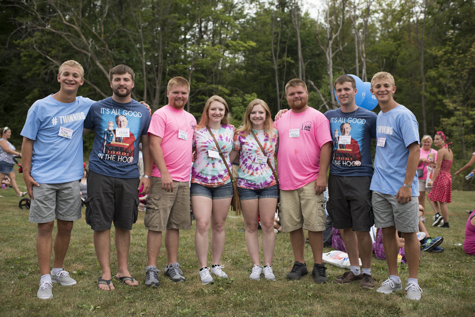 Groups of identical twins pose for a portrait at the 40th annual Twins Days Festival in Twinsburg, Ohio on Saturday, August 8, 2015. Photo by Dustin Franz