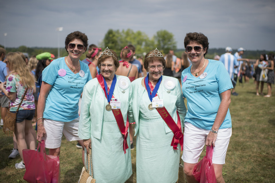 From left, Dorris Fejka, Charlotte and Rose Italiano and Donna Saxman pose for a portrait at the Twins Days Festival in Twinsburg, Ohio on August 8, 2015. Photo by Dustin Franz
