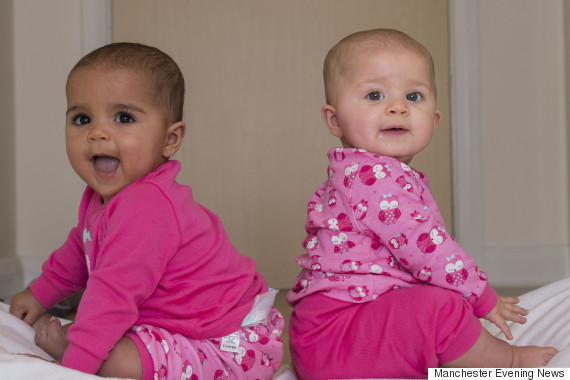 FEE £75 per image online and £150 for hardcopy : Must Credit Sunday MIrror   THIS little pair of cuties are enough to make anyone do a double take.  And seven-month-old twins Anaya and Myla get even more attention because they each picked up traits from different parents. Myla takes after mixed-race dad Kyle Armstrong, 24, while sister Anaya is a fair copy of mum Hannah Yarker, 20.   Staff Picture by : Andy Stenning Mixed twins of Hannah Yarker and Kyle Armstrong. Myala (darker skin) and Anaya who has lighter complexion from Wythenshawe Greater Manchester. See Story by Nicola Bartlett